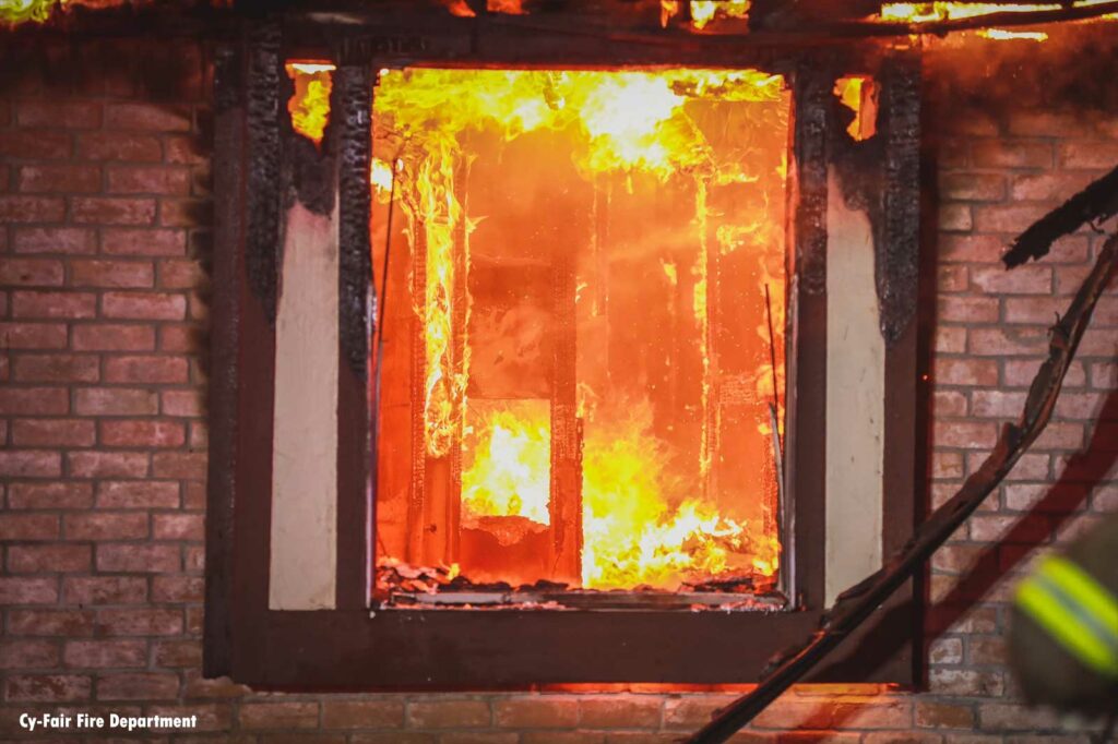 Flames seen in the interior of a home