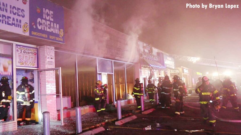 Smoke from storefront at commercial fire on Long Island