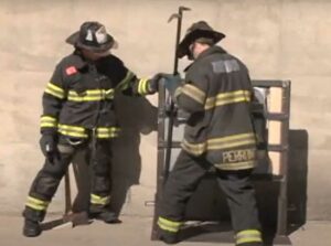 John Buckheit and Mike Perrone on using a hook and halligan to overcome a metal door