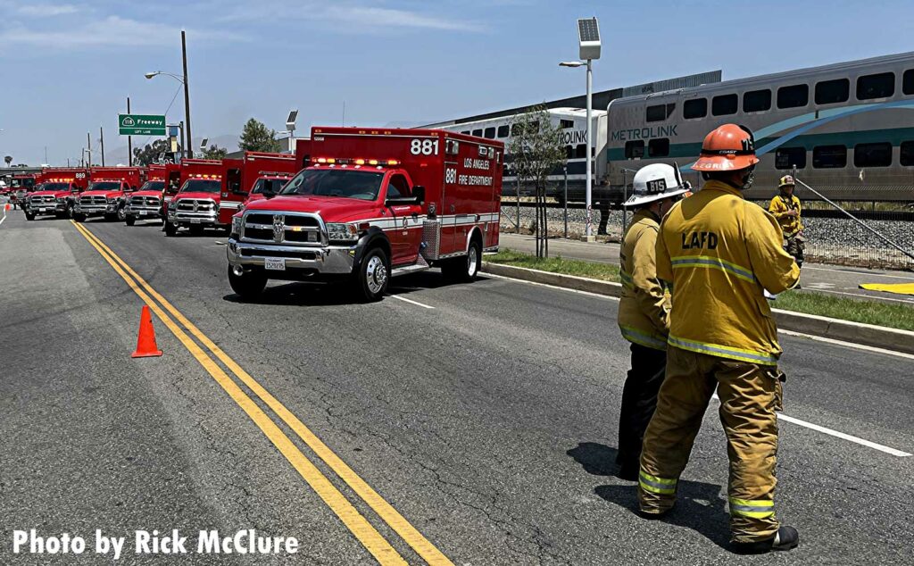 LAFD firefighters stand near ambulances staged at scene of rail incident