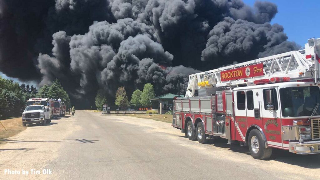 Rockton fire apparatus with vast plumes of heavy black smoke