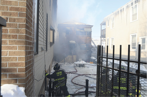 A view from the A side of the structure. Although smoke is covering it here, there is a section along the B side that could be walked down. Snow was up to my hips as I made it down this “gangway.”