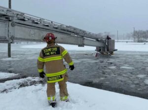 occupants were placed into the tower ladder and brought safely to shore.