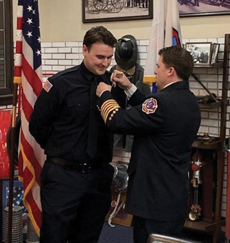 The pinning ceremony represents the chief’s pledge to keep his firefighters safe during their tenure and is the most solemn duty a chief can fulfill.