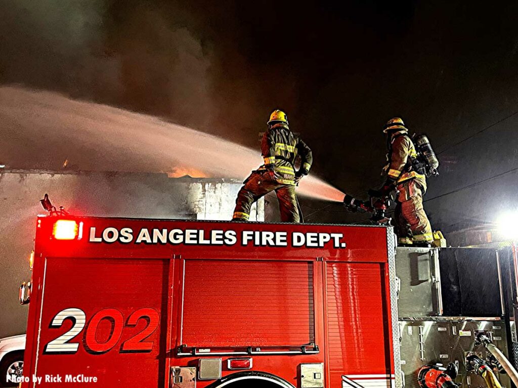 LAFD firefighters with master stream