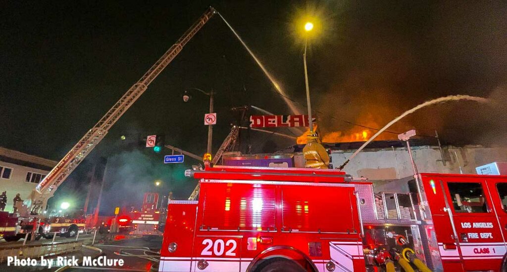 Aerial ladder extended above Los Angeles structure fire