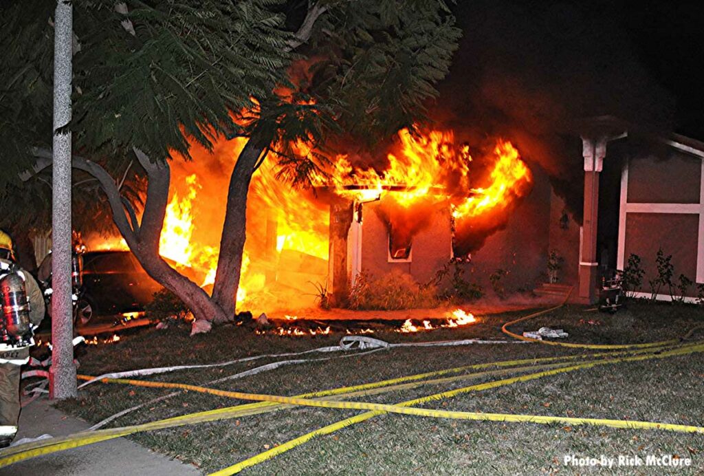 Flames roll from attached garage