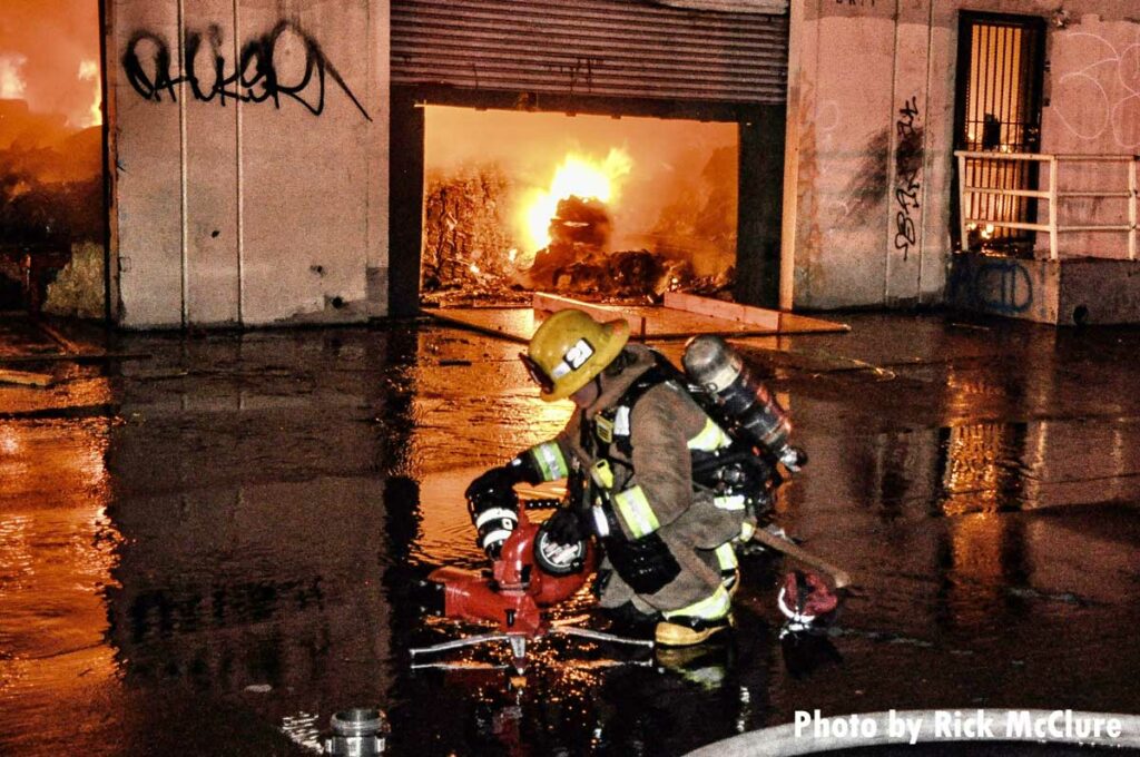 Firefighter sets up portable monitor