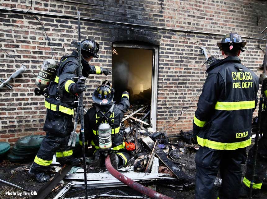 Firefighters at hoarding fire in Chicago at W Flournoy