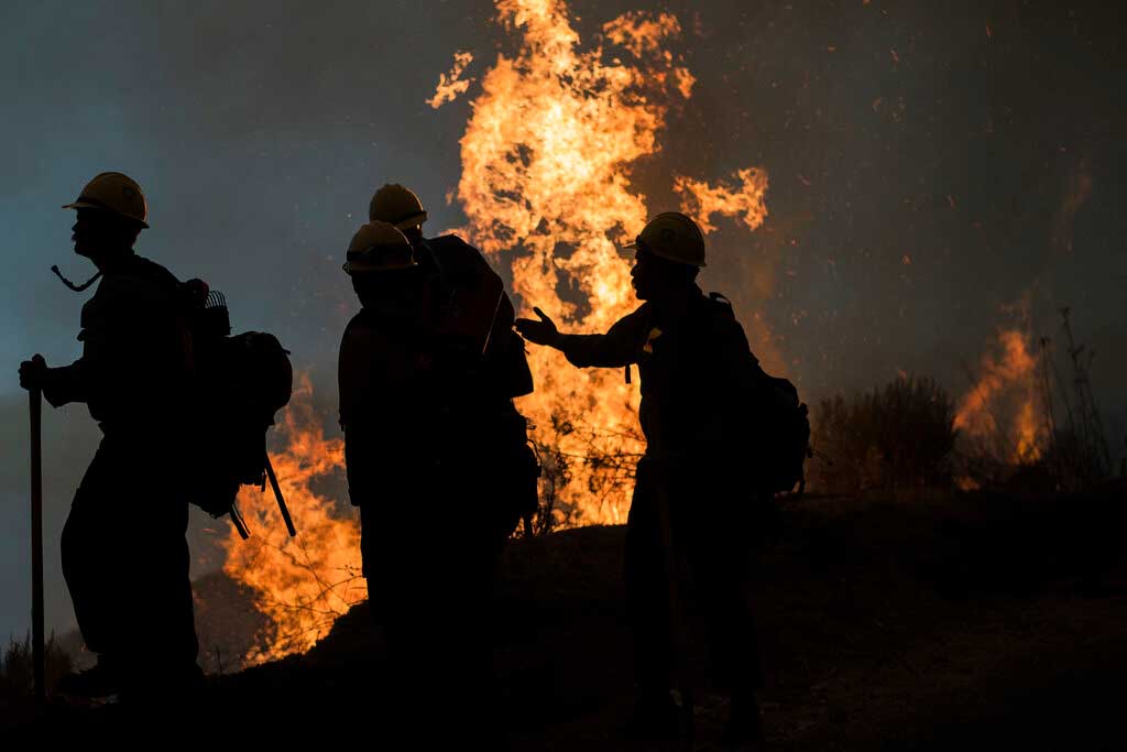 Fourteen firefighters, not pictured, deployed emergency shelters on Sept. 8, 2020, as flames from the Dolan Fire