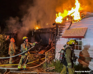 LAFD firefighters put water on house fire