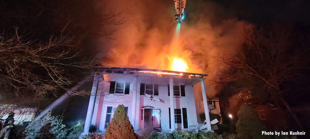 Aerial device with master stream over Dearborn house fire