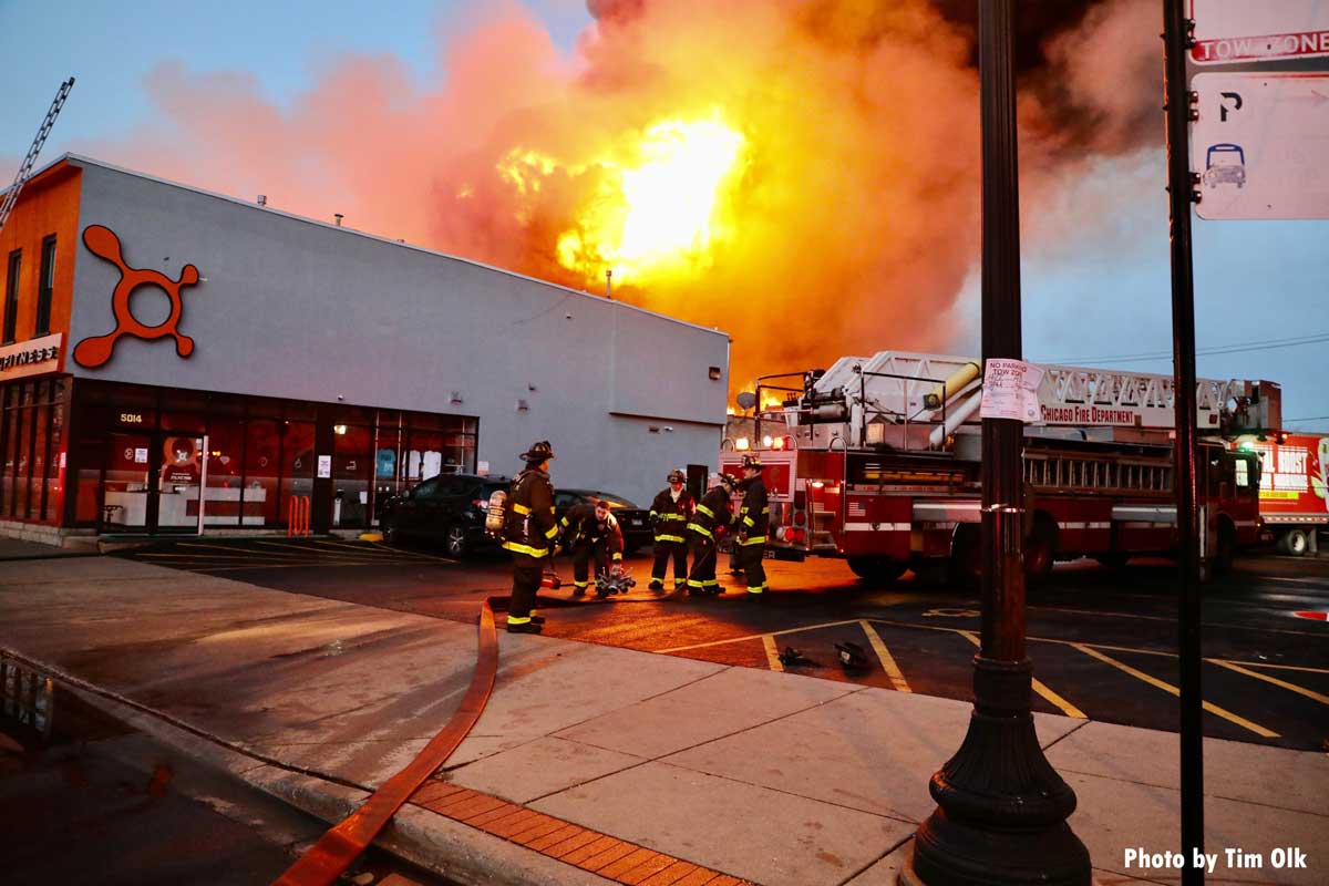 Flames shoot into sky with Chicago firefighters