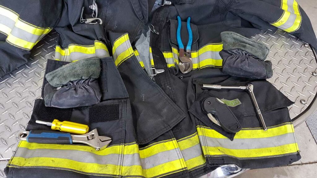 Firefighter PPE with a variety of tools