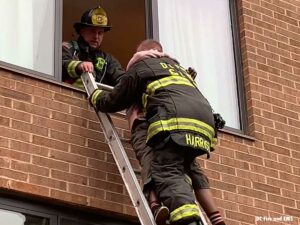 D.C. firefighters remove residents via ladder