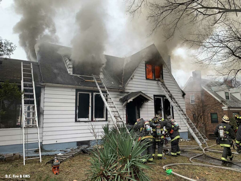 Multiple ladders as firefighters mask up at D.C. fire