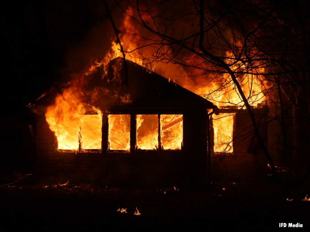 Flames engulf a home in Indianapolis, Indiana, in January 2023