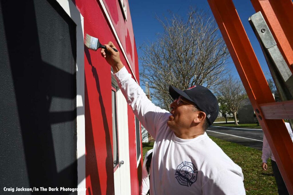 Orlando firefighter painting at Children’s Safety Village