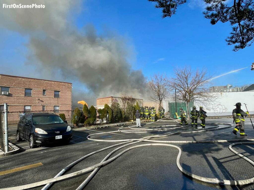 Multiple hoselines at Queens fire