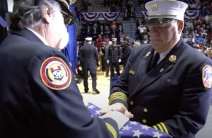 NFFF Memorial weekend 2024 firefighter handed flag