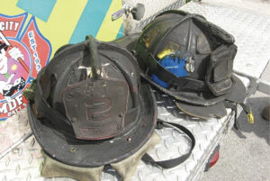 Burned firefighter helmets and PPE