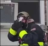 Firefighter masking up