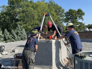 Firefighters Cleveland chimney rescue school