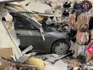 Car crashes into mall