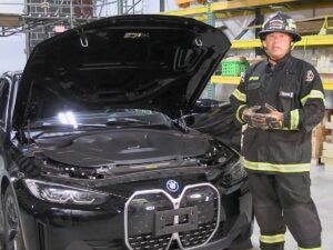 Jason Defosse with BMW EV