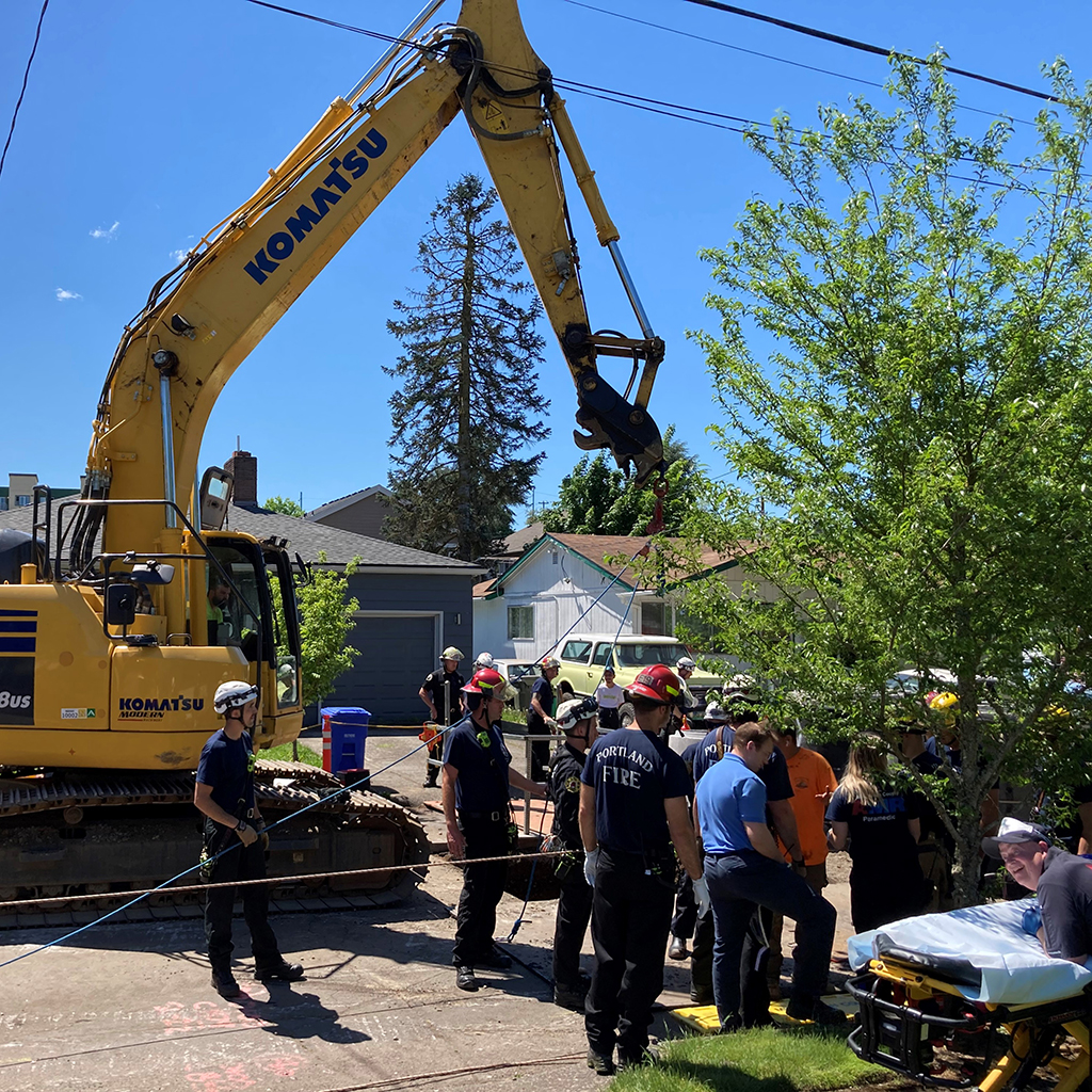 1. The rigging for the rescue was set up off the excavator and on site after a careful examination of its boom, hook, shackle, and pad eye for use as a high directional point.