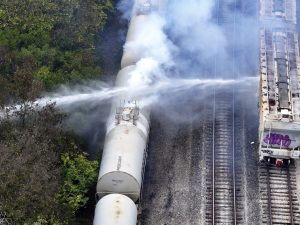 Firefighters work on the scene of a chemical leak