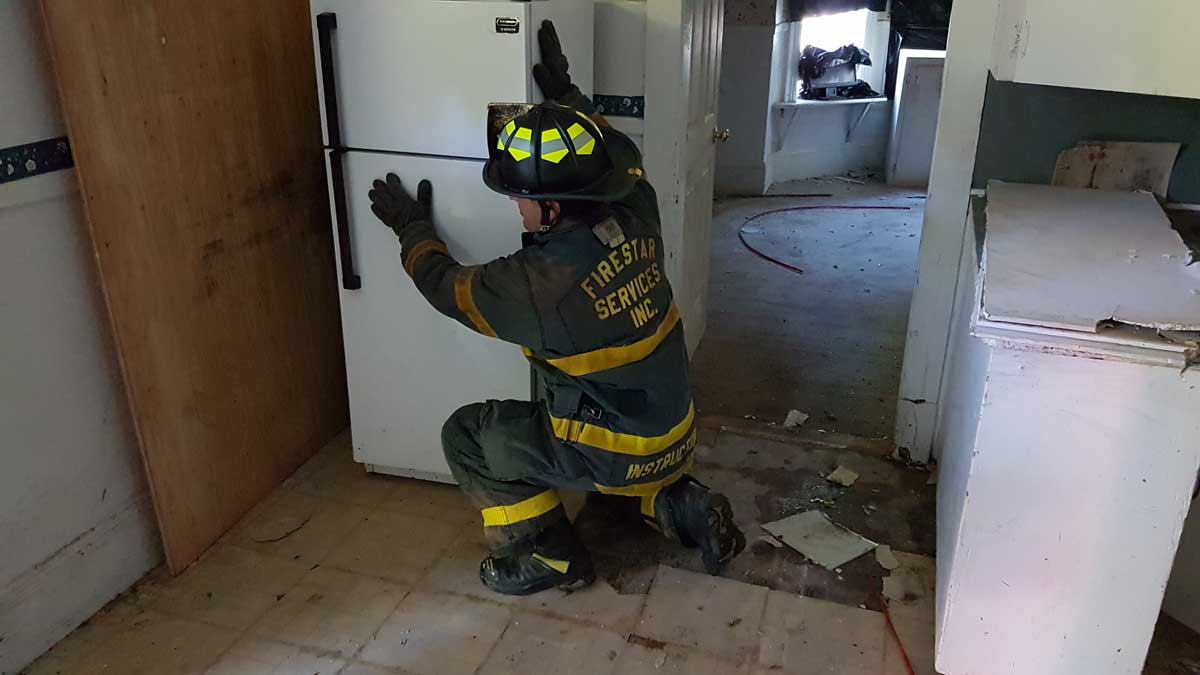 Firefighter search a fridge