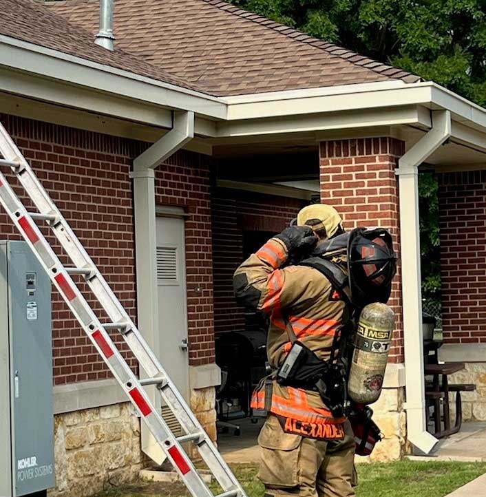 Arlington firefighter Dale Alexander drilling his riding assignment