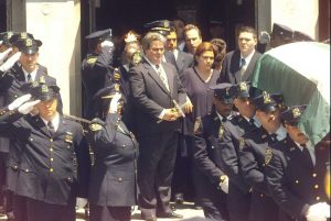 Widow Margaret Mosomillo at funeral of NYPD husband