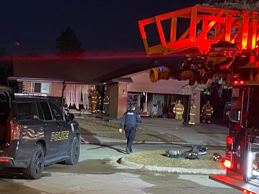 firefighters at a house explosion