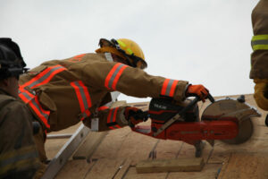 Firefighter training roof cuts at FDIC 2014.